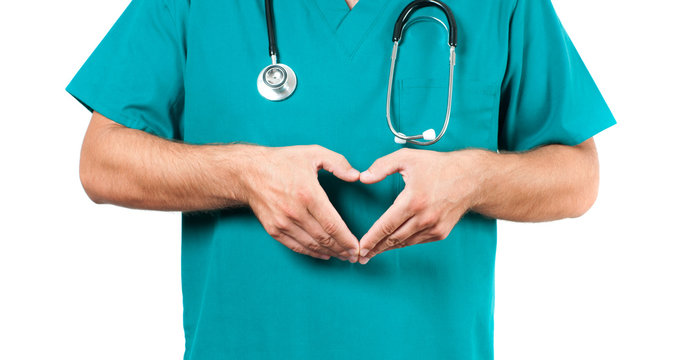 Male Doctor With Stethoscope Is Making Heart Shape.