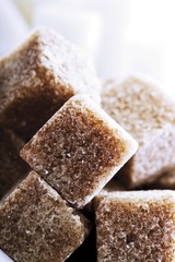 Brown and white sugar cubes