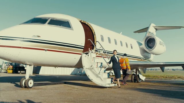  Middle Eastern VIP businessman disembarking from private jet