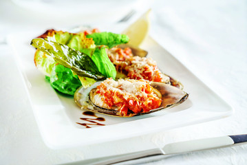 mussels baked with parmesan and herbs