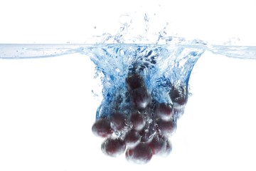 Grapes dunked into water
