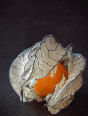 Cape Gooseberries or Physalis Tropical on black Table