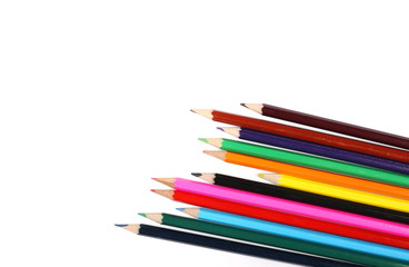 Color pencils isolated on white, top view