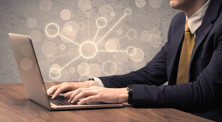 Science worker typing on laptop computer