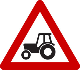 Warning sign with farm tractor