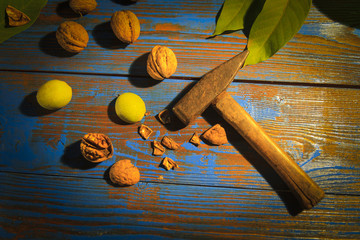 walnuts and hammer on the table