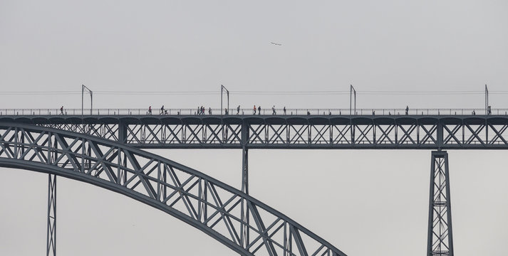 Fototapeta D. Luis Bridge Silhouette in a foggy day, Oporto, Portugal.