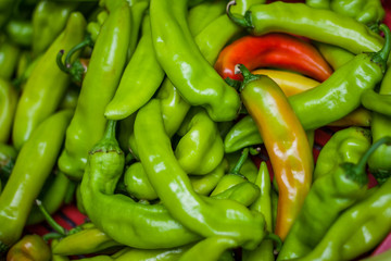 Green and red pepper on natural background. Abstract food design