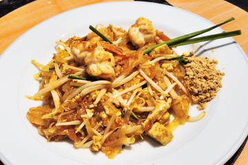 Thai Cuisine: Shrimp Salad with Sauce and peanut flour - selective focus