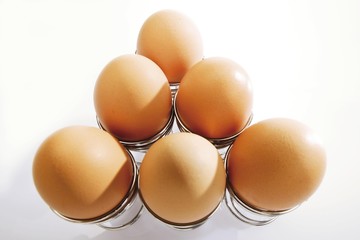 Eggs in spiral-shaped eggcups