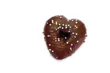 Chocolate coated gingerbread heart biscuit with sugar pearls