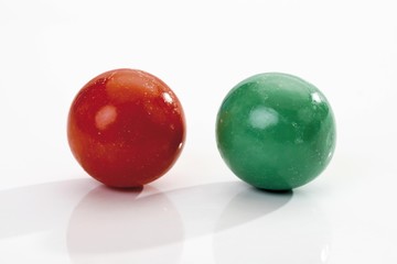 A red and a green gumball