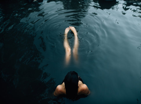 Woman floating in water