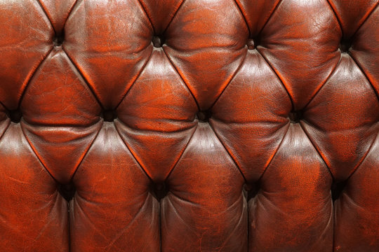 Red leather couch detail