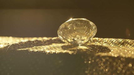 Large faceted diamond on shimmering rotating stand, wealth and luxury concept - Powered by Adobe