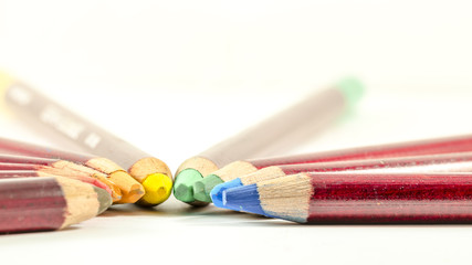 Fototapeta premium the coloured pencils, frontal view of colored pencil grouped together