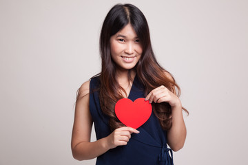 Asian woman with red heart.