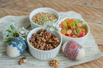 Ingredients for baking Easter cake - eggs, milk on wooden background