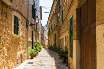 Cobbled stone narrow street at Soller village, Majorca, Spain