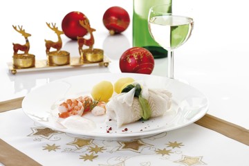 Halibut roulade with a ribbon made of leek, scampis, potatoes and zabaglione