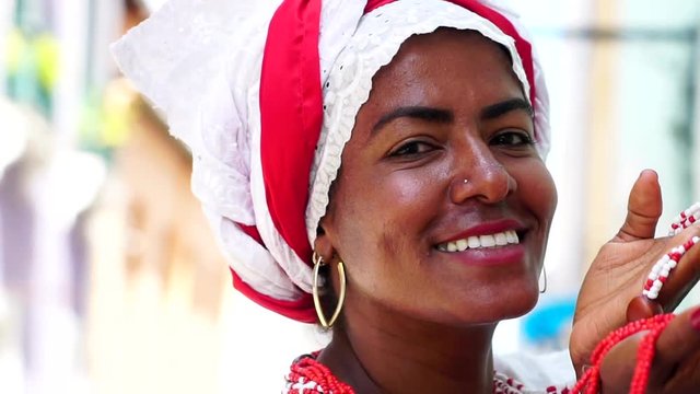 Brazilian Woman (Baiana) dancing in Salvador, Bahia, Brazil