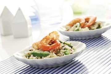 Rice dishes with shrimp, pea pods, long-grain rice and wild rice
