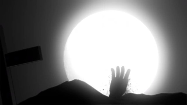Halloween themed animation depicting a hand rising out from a grave. 4K UHD animation rendered at 16-color depth. Broadcast quality.