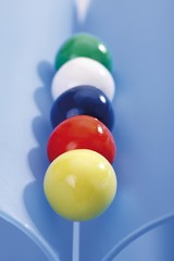 Multicoloured gumballs in a row