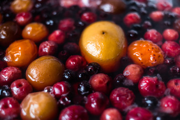 Healthy food, colorful stewed various fruitss in pan