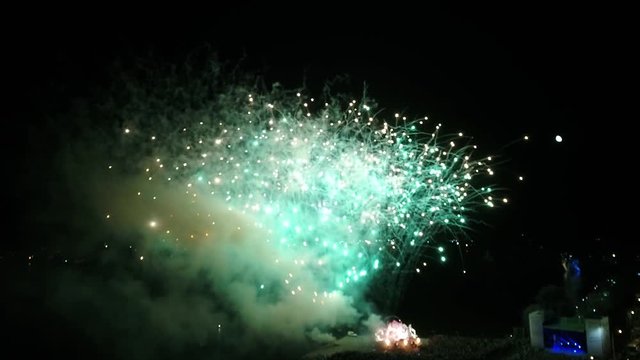 Beautiful fireworks near the concert stage, aerial shooting