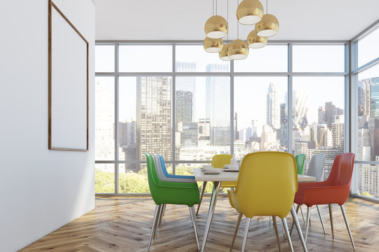 Dining room with colorful chairs, side