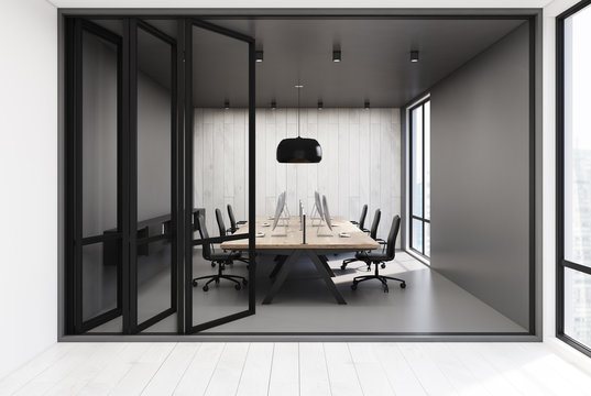 Open space office, gray and wooden walls
