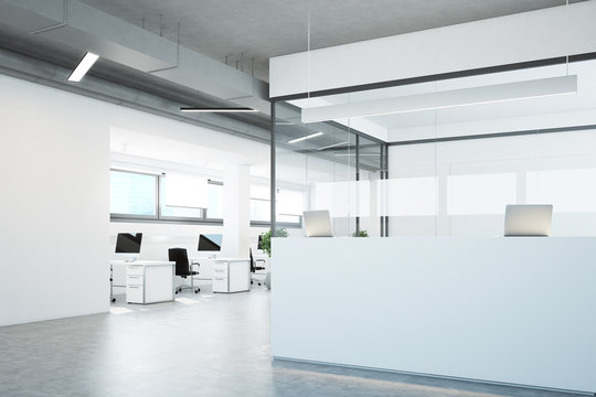 White reception in a white and glass office