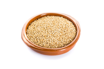 sesame placed in a bowl on a white background