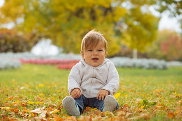 Child enjoying autumn time