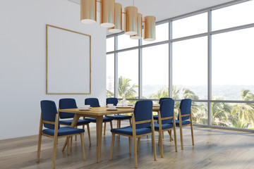 Dining room with a poster, palms, corner