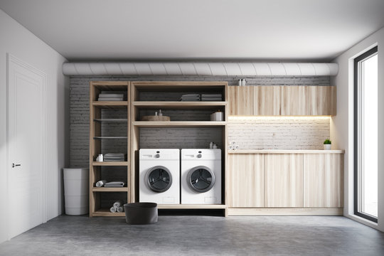 White And Wooden Laundry Room Interior