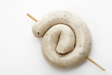 Rolled, raw bratwurst