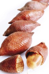 Salak or Snake Fruit, whole and cut open (Salacca zalacca)
