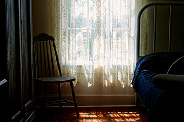 detail of backlit bedroom curtains