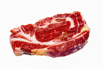 ribeye steak of marbled beef on white background, isolated.