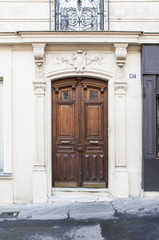 Naklejka na ściany i meble The door of an old tenement house