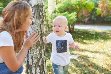 Fototapeta premium Happy beautiful mother and baby daughter or son