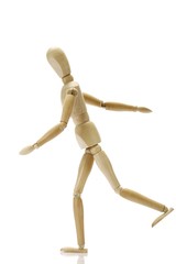 Wooden jointed figure walking