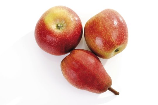 Red fruit, apples and a pear