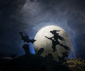 Halloween witch flying on broomstick,   Halloween background.