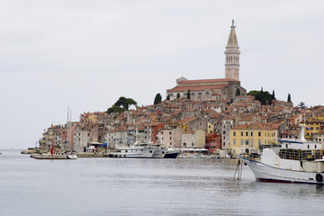 Fototapeta premium View across the harbour towards the historic town, Rovinj, Istria, Croatia.
