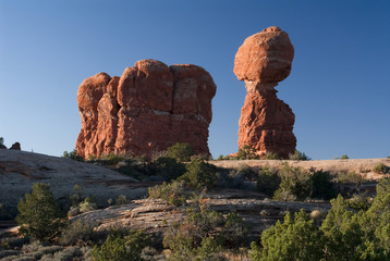 Balancing redrock boulder Balanced Rock in morning light Arches National Park Utah USA