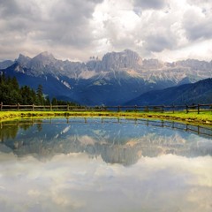 Rosengarten Alps reflected in Lake Wunleger near Tiers, Bolzano-Bozen, Italy, Europe