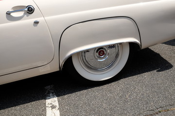 Side View of Vintage Classic Car Rear Wheel On Road